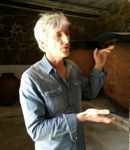Vasco Croft of Aphros, in front of some of his amphorae. (Photo by Laurie Daniel)